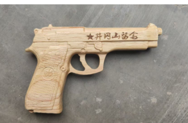 实木浮雕枪